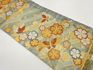 曲線に桜・蝶模様織出し袋帯